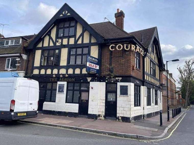 The Albion public house on the corner before demolition