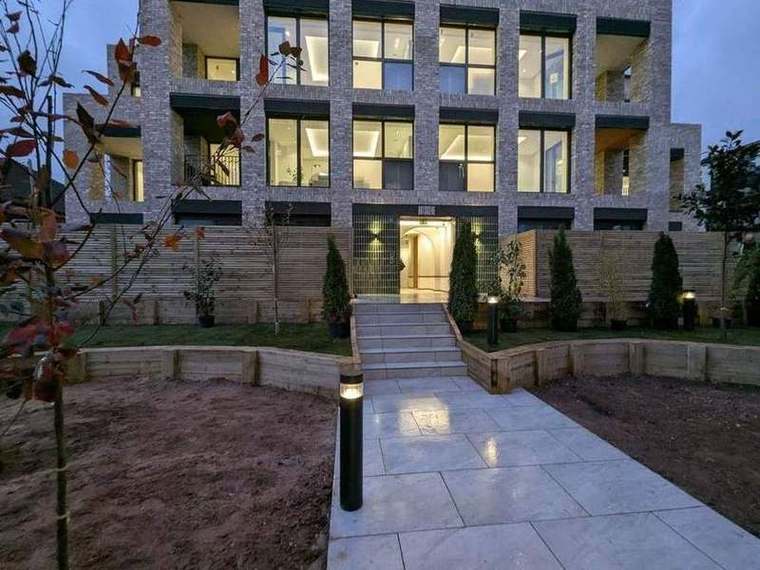 Landscaped courtyard at Artscene at dusk