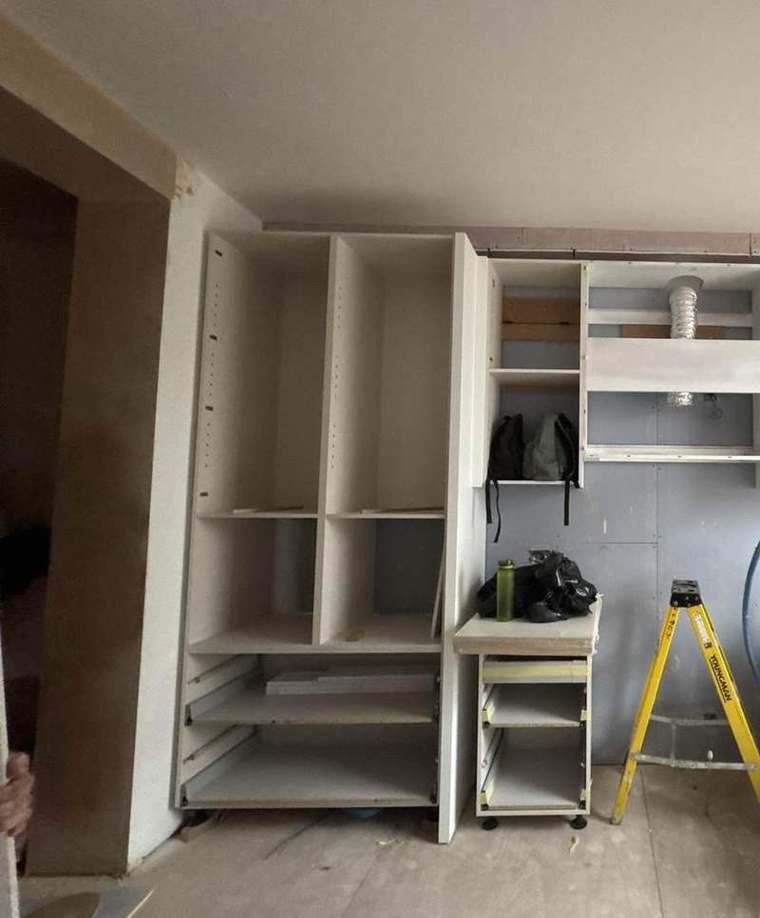 Fitted wardrobe and storage joinery being installed