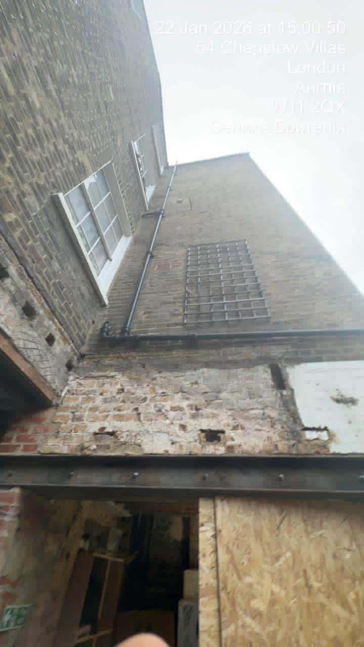 New metal grating over the lightwell between the buildings