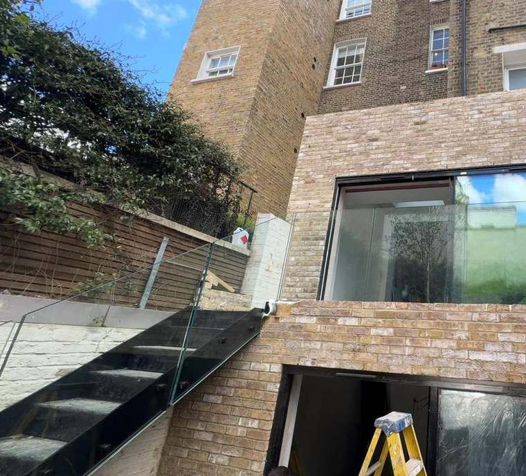 New rear elevation in brick with large glazed opening