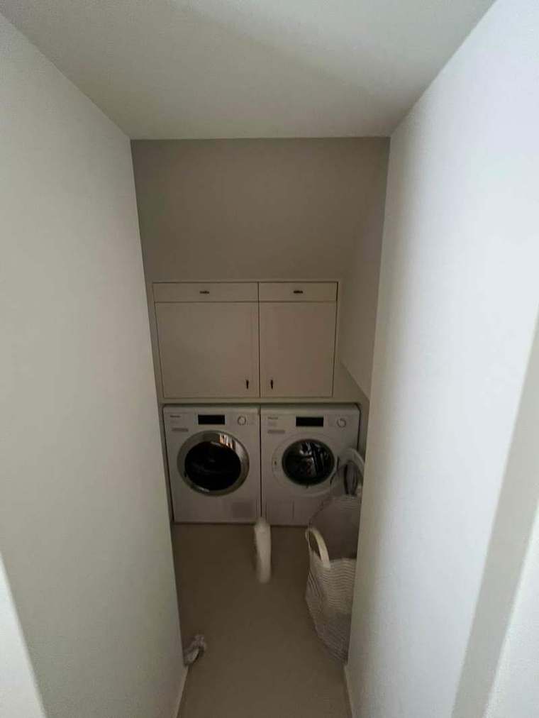 Fitted utility room with laundry appliances