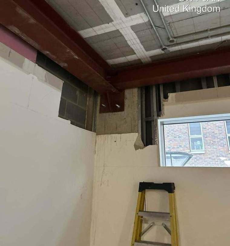 Steel beam seated over the new structural opening