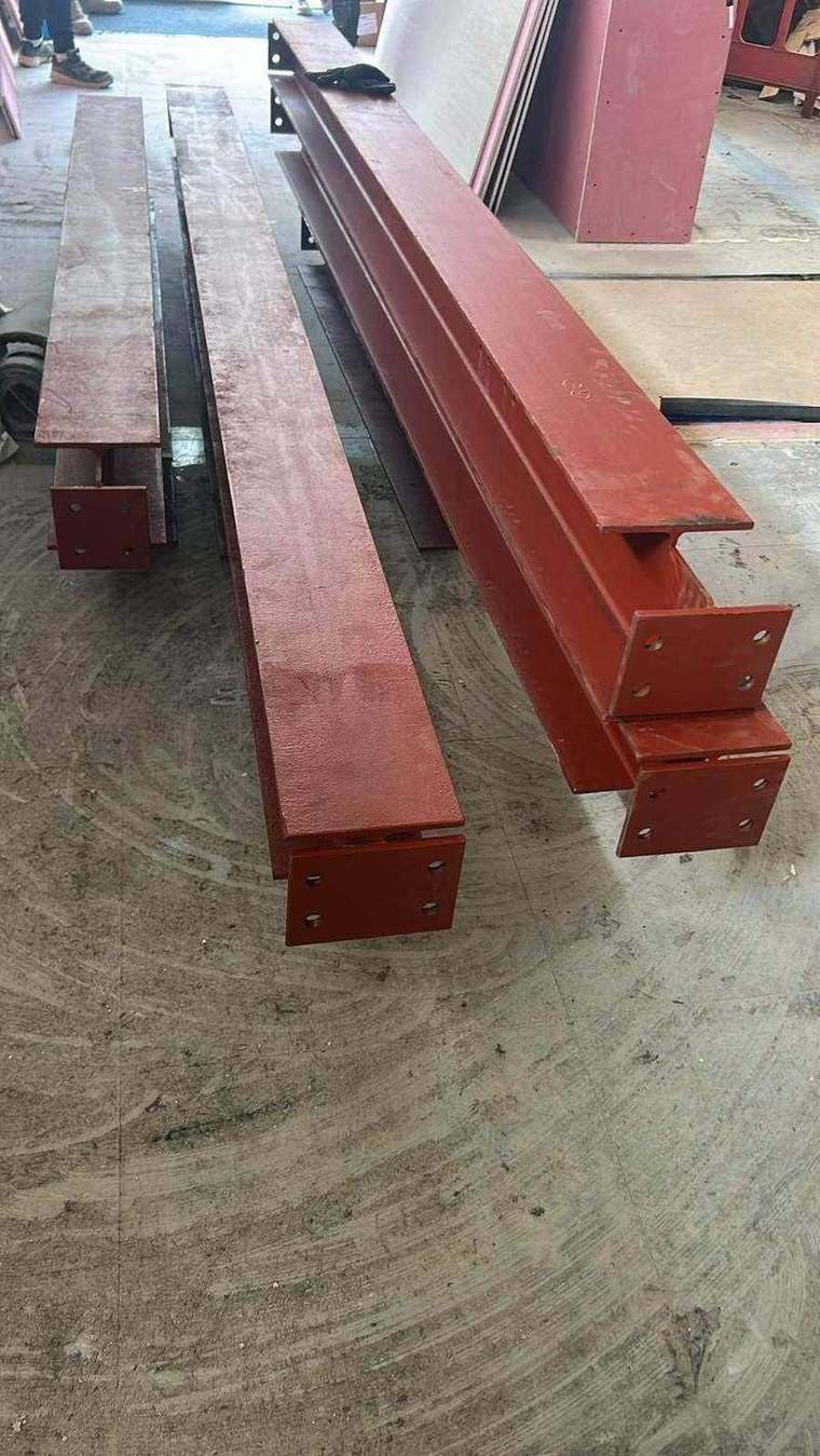New painted structural steel beams with welded end plates