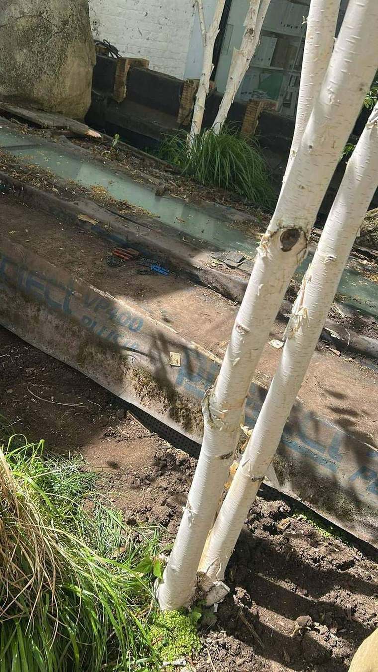 New waterproofing build-up laid against the wall