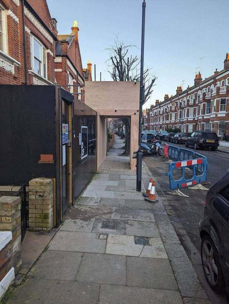 Site hoarding and access on Perrymead Street, Fulham