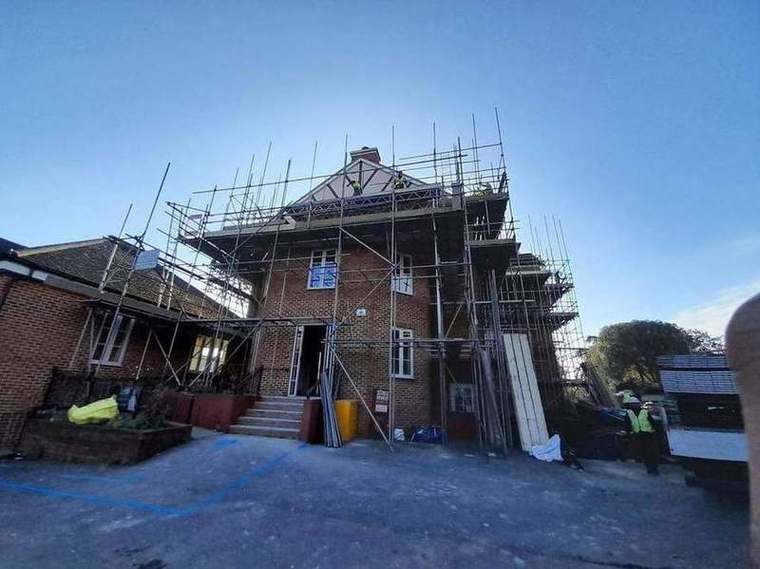 Scaffold going up around Struan House at the start of works