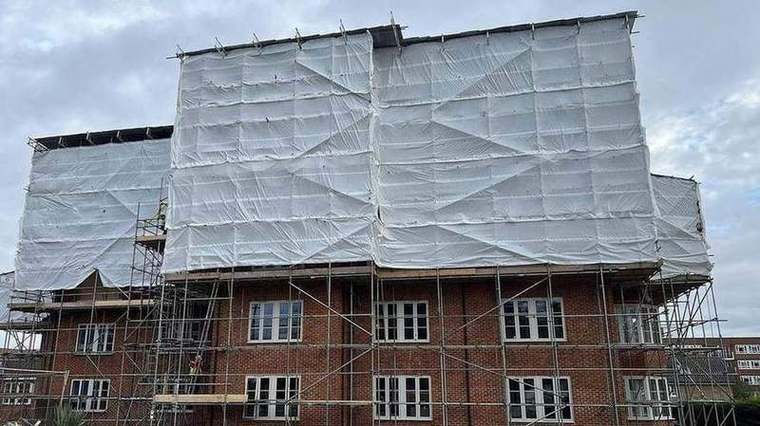 Fully sheeted scaffold around Struan House